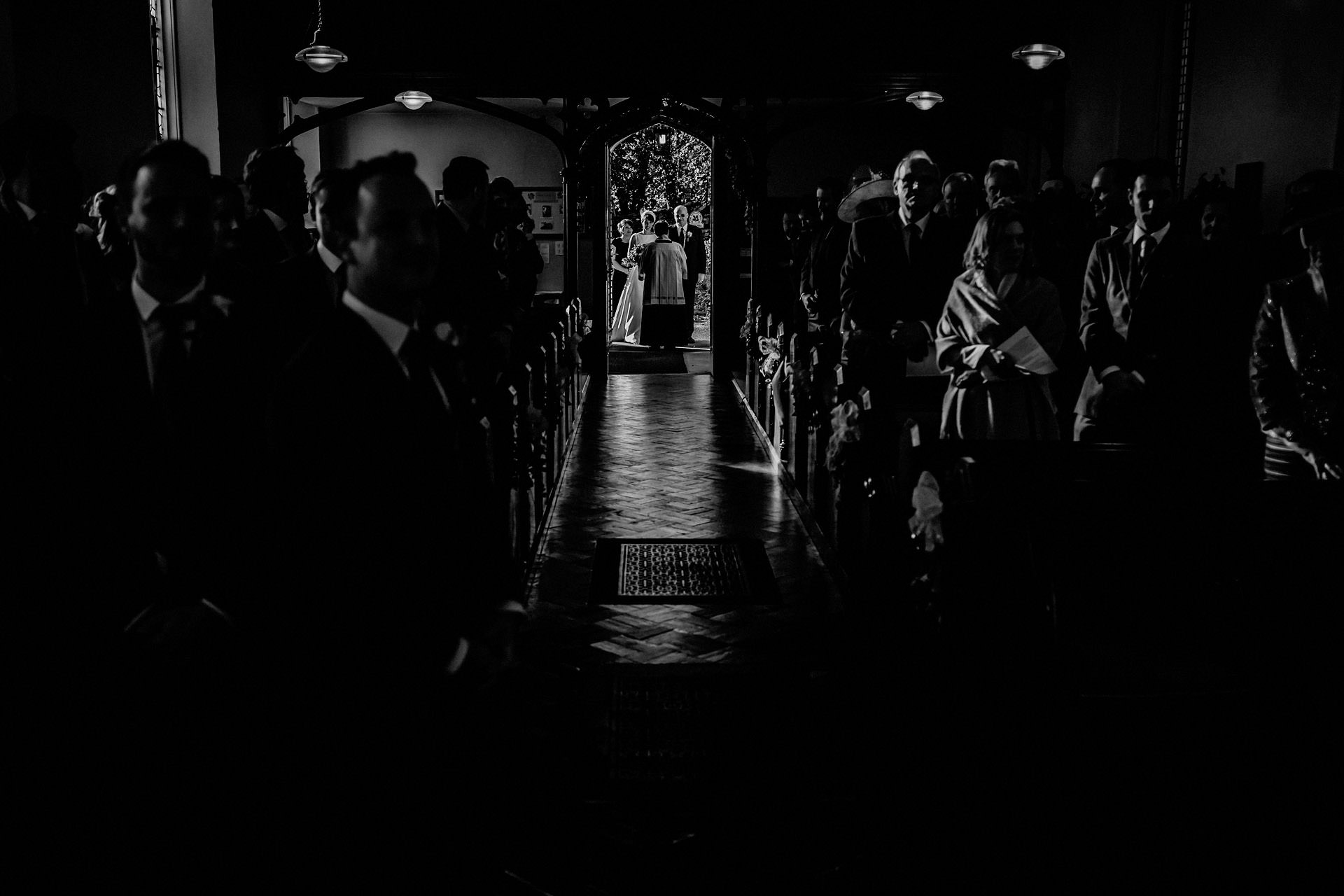 the bride just about to step in the church at rydal, cumbria