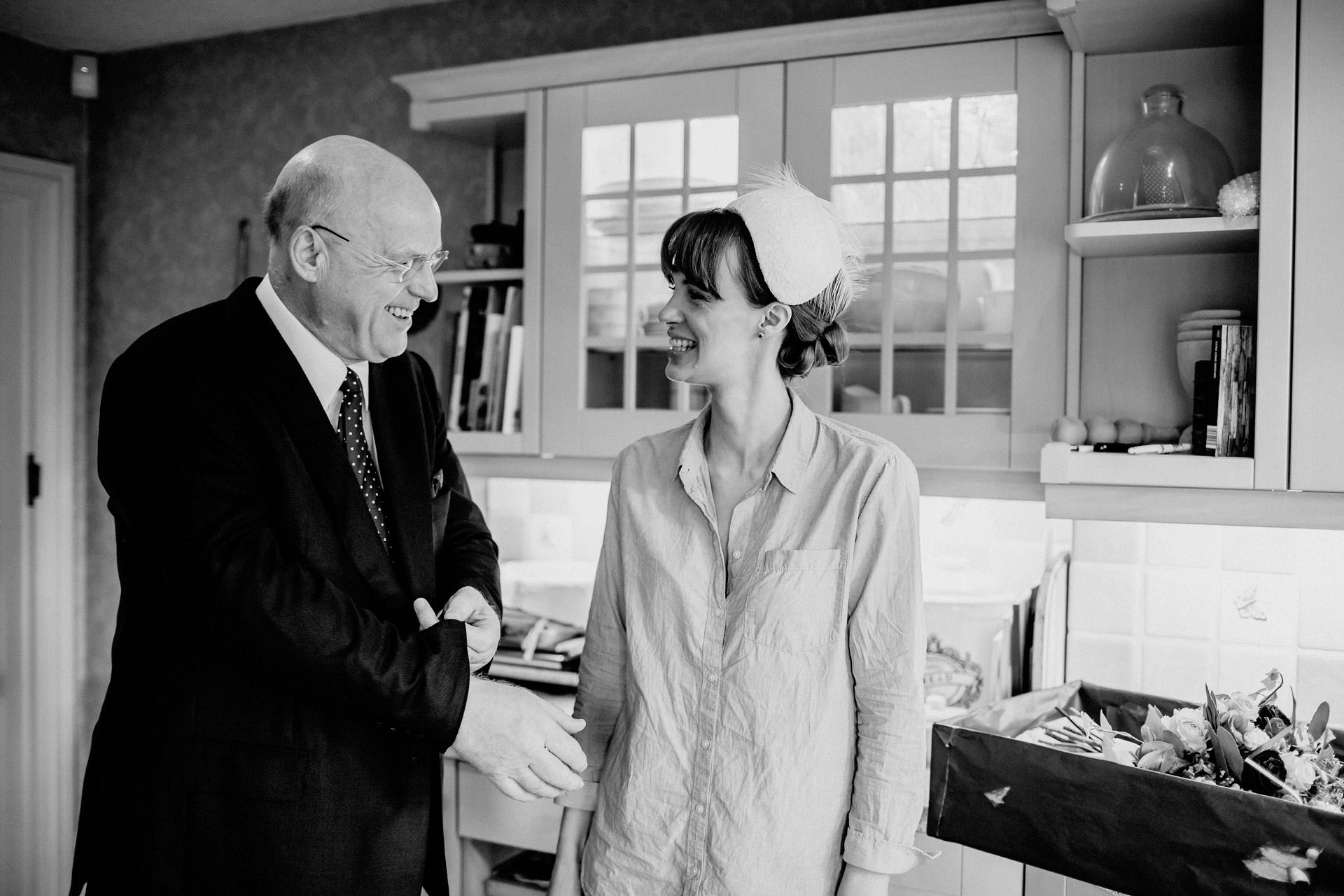 father of the bride getting ready, black and white photo